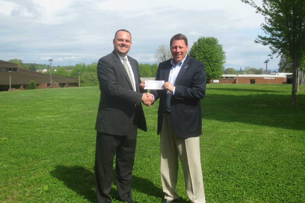 Photo of check presentation. 