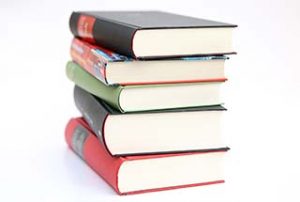 Photo of a stack of books to represent the WPCC Bookstore