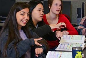 3 Interpreter Education students practice American Sign Language in Class