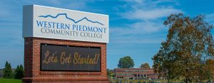 Photo of the WPCC sign at the road with Let's Get Started on the message board