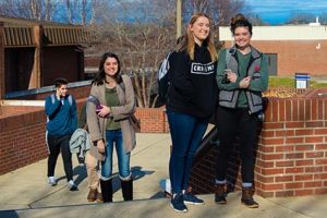Several WPCC students walking between classes on the main campus