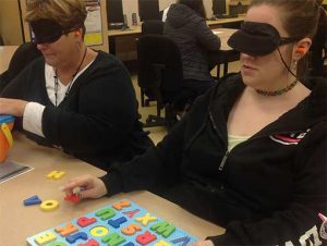 Photo of 2 WPCC students experiencing the world in blindness