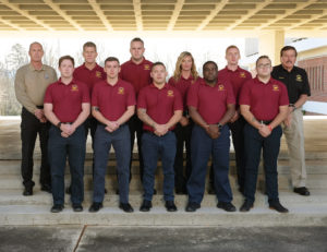 Class group picture of nine fall 2020 Basic Law Enforcement graduates, including instructors.