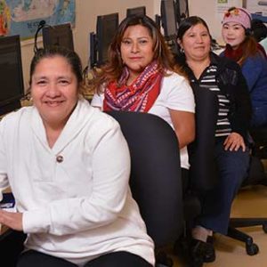 Photo of WPCC Hispanic and Hmong students in a computer lab