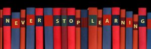 Books with the words Never Stop Learning as their titles