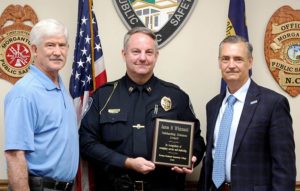 Ronnie Thompson, Captain Jason Whisnant, and WPCC President Dr. Joel Welch