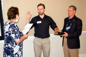 Image of a man being sworn in at WPCC