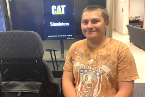 Image of a male student smiling