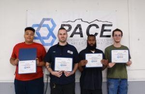 Image of 4 pace students holding certificates