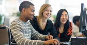 Image of 3 students smiling.