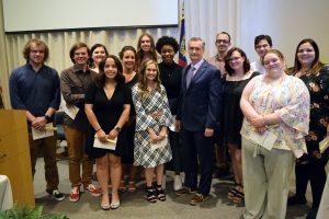 Image of 13 students with wpcc president dr. welch.
