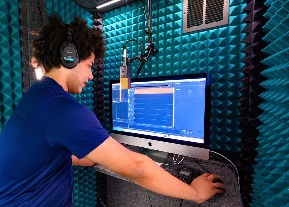 sound_booth Man in a recording booth