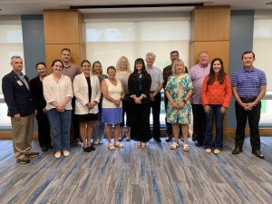Image of the Western Piedmont Foundation board smiling for a photo