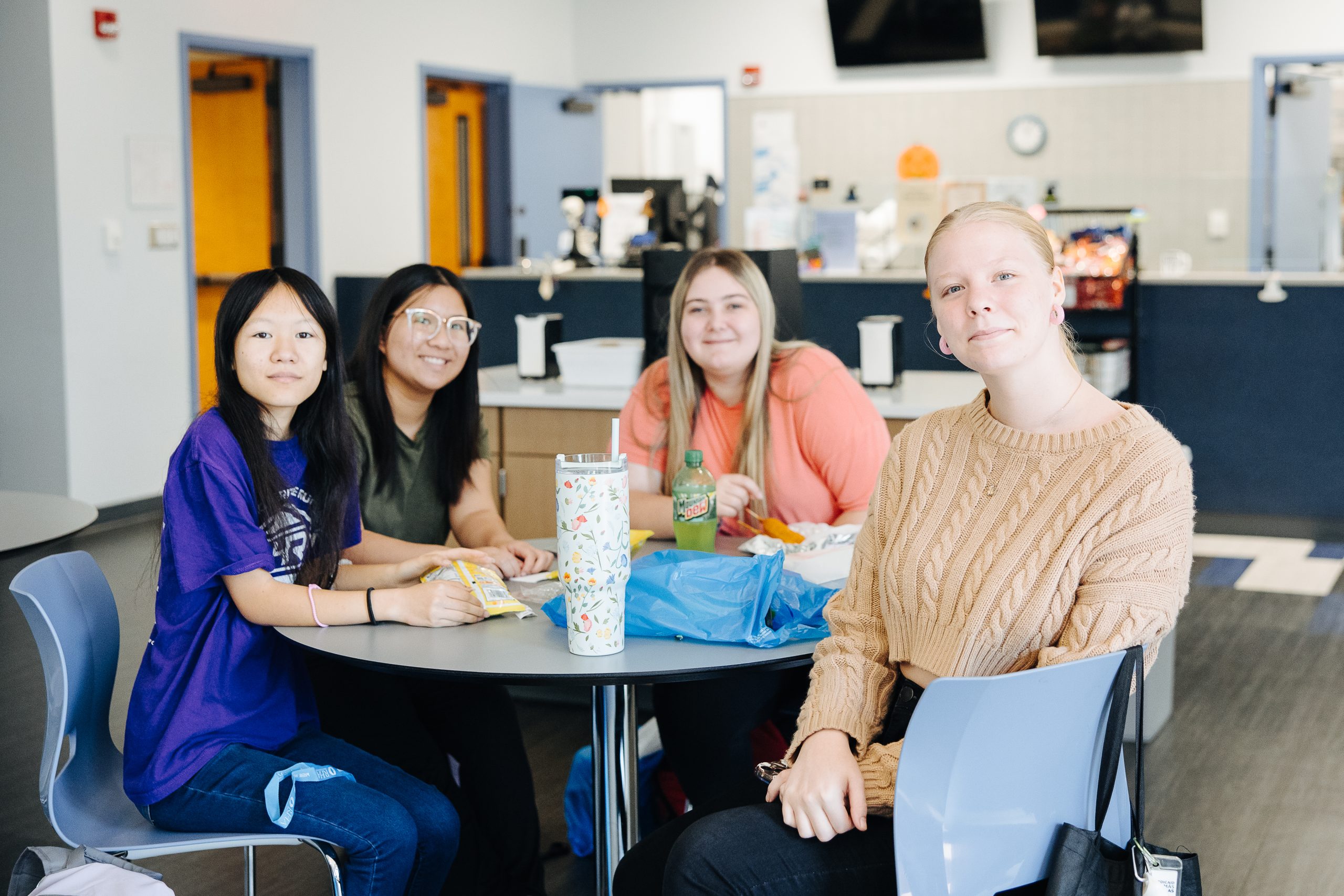 A small group of WPCC students collaborating around a table